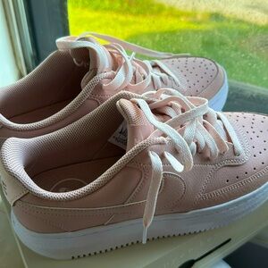 Pink Nike tennis shoes size 10! Never worn!